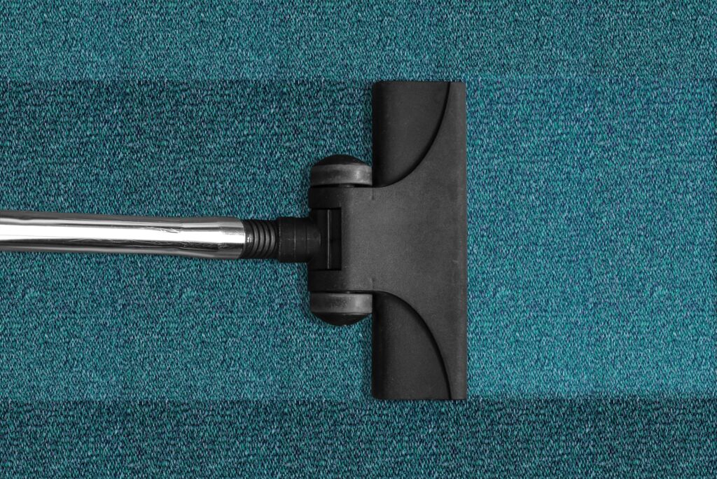 dirty carpet cleaning with vacuum cleaner